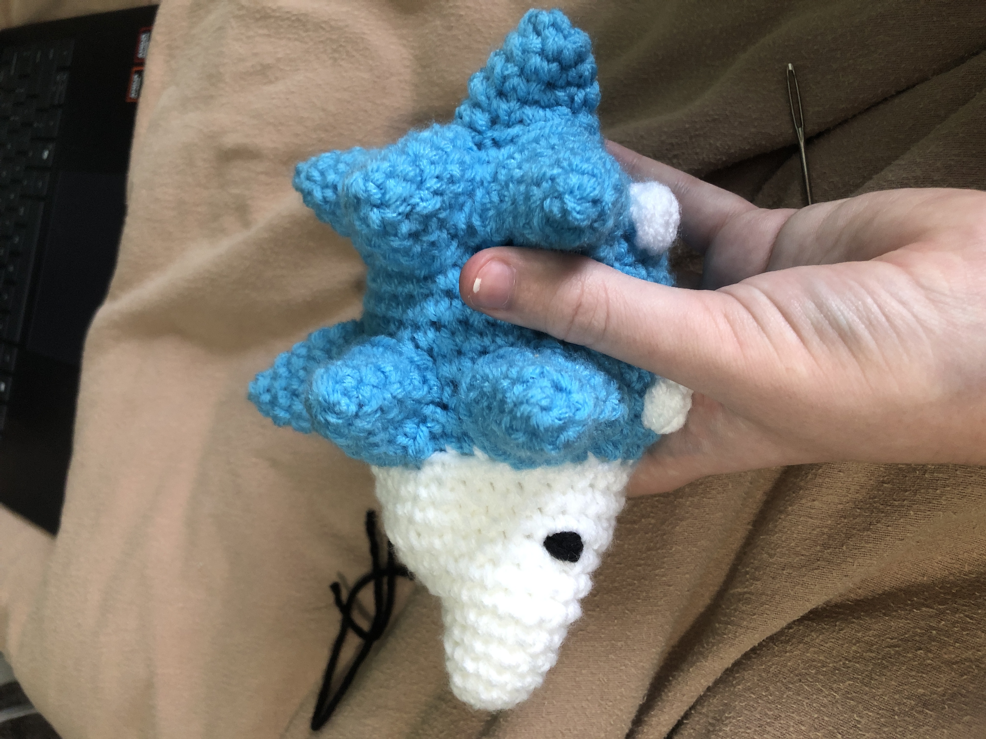 An amigurumi Snom from Pokemon