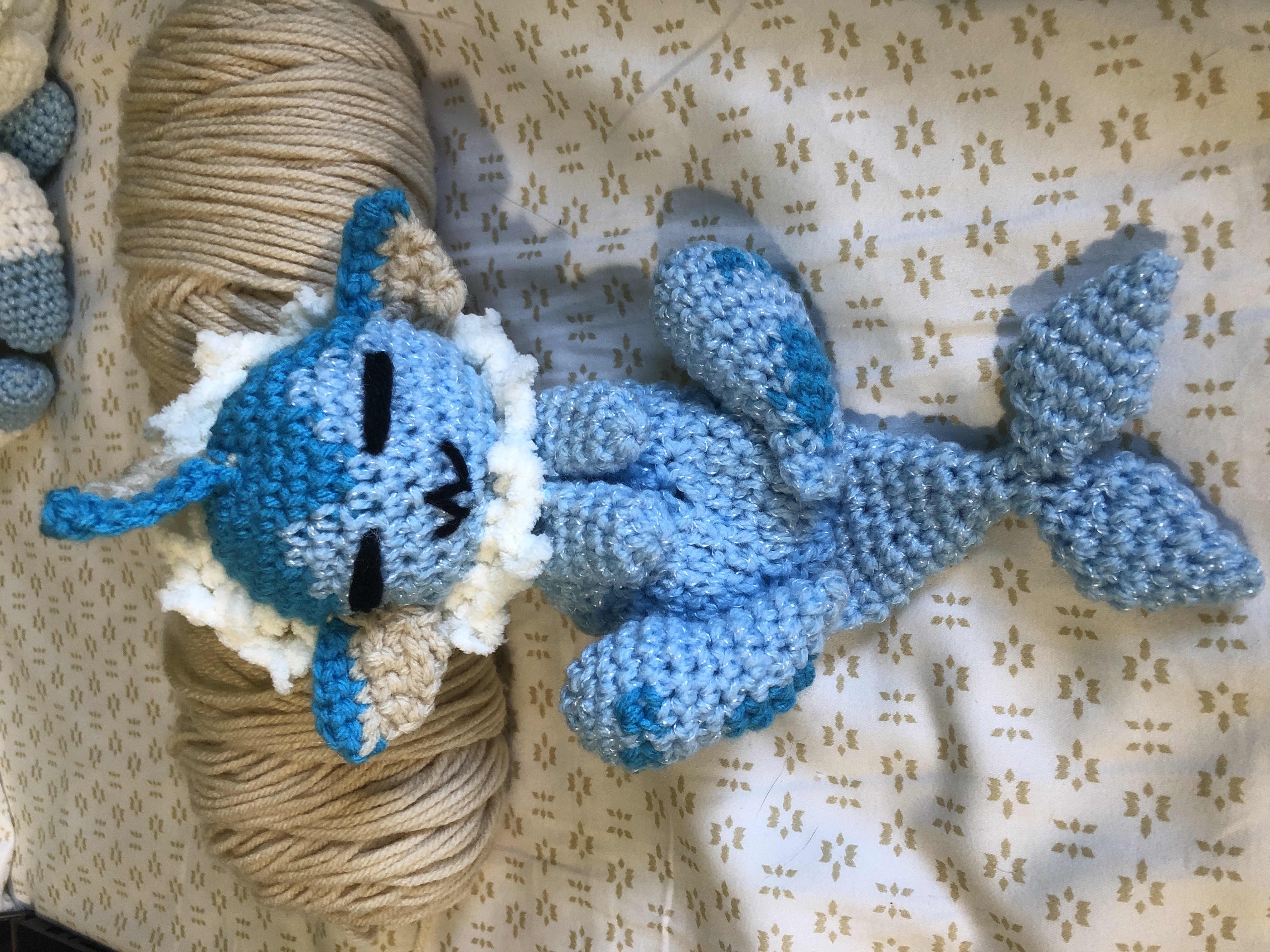 An amigurumi Vaporeon